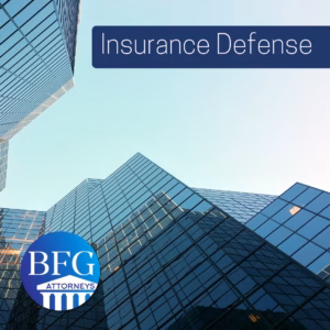 An insurance company building. With the Bangerter Frazier Group-Attorneys logo and a banner reading Insurance Defense.